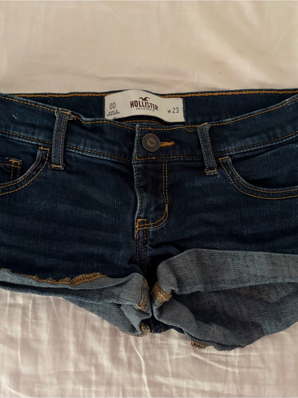 Hollister Jeans Label with Red Logo and Blue Denim